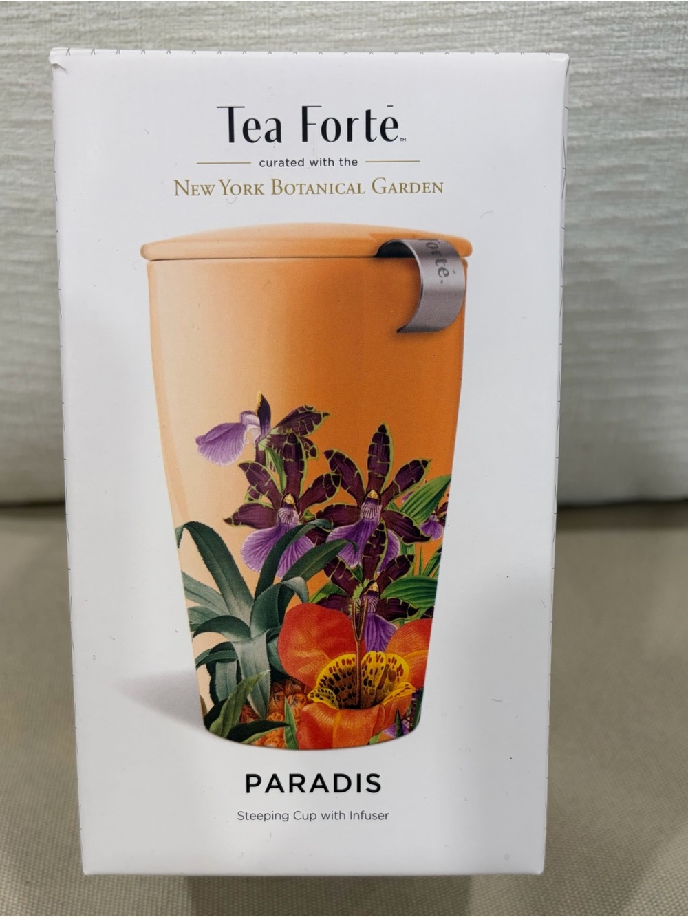 Forte Orange Ceramic Steeping Cup with Floral Accent